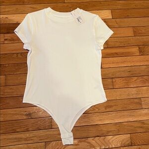 NWT white body suit